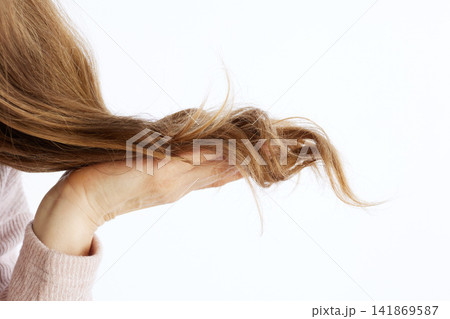 Detailed View of Brittle Hair Ends Against White Detailed View of Brittle Hair Ends Against White 141869587
