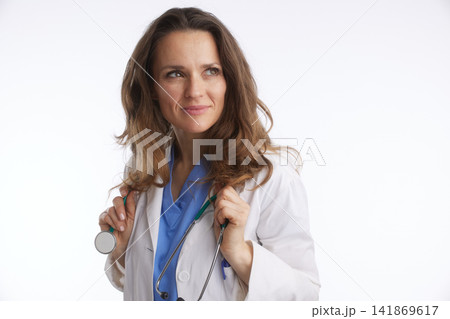 Thoughtful Doctor Looking Upwards with Stethoscope Thoughtful Doctor Looking Upwards with Stethoscope 141869617