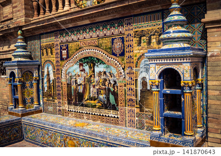 General view of ceramic tile bench alcove with coat of arms at Plaza of Spain in Seville General view of ceramic tile bench alcove with coat of arms at Plaza of Spain in Seville 141870643