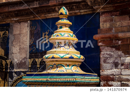 Close up of colorful ceramic tile column head capital at Plaza of Spain in Seville 141870974