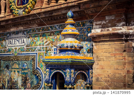 Close up of colorful ceramic tile column head capital at Plaza of Spain in Seville 141870995