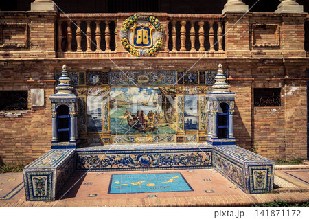General view of ceramic tile bench alcove with coat of arms at Plaza of Spain in Seville 141871172