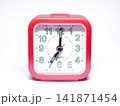 Red Retro Alarm Clock Showing 07:00 Time Isolated on Background Vintage Timepiece 141871454