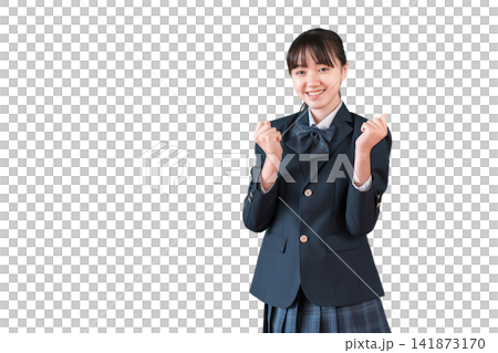 Elementary, middle, and high school girls in blazers making a victory pose. 141873170