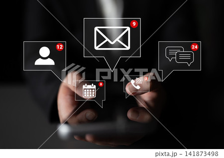 Modern Digital Communication Concept with Notifications for Emails, Messages, Calendar Events, and Contacts in Hands Holding a Smartphone. Sentient 141873498