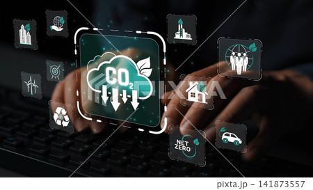 A hands-on digital interface showcasing carbon reduction strategies through various icons. Emphasizes the importance of sustainability and renewable energy in modern technology. Sigmoid A hands-on digital interface showcasing carbon reduction strategies through various icons. Emphasizes the importance of sustainability and renewable energy in modern technology. Sigmoid 141873557