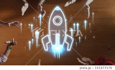 Dynamic hands surround a glowing rocket illustration on a wooden surface, symbolizing collaboration and innovation in business growth and the journey toward new ideas. Sigmoid Dynamic hands surround a glowing rocket illustration on a wooden surface, symbolizing collaboration and innovation in business growth and the journey toward new ideas. Sigmoid 141873576