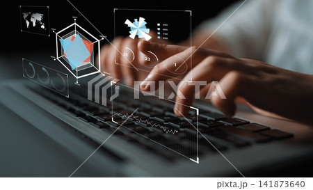 Hands typing on a laptop keyboard with holographic data visualization, charts, graphs, and analytical metrics displayed on a dark background Gluon Hands typing on a laptop keyboard with holographic data visualization, charts, graphs, and analytical metrics displayed on a dark background Gluon 141873640
