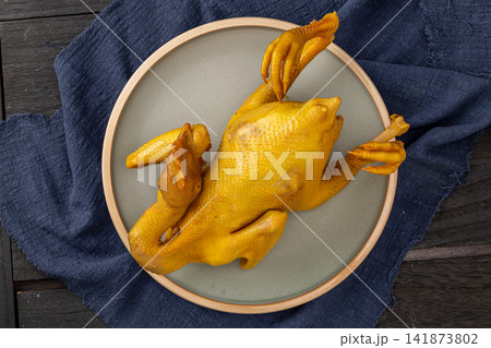 traditional Guangdong Hakka Salt Baked Chicken Whole Steamed Herbal Marinated Yellow Feathery Poultry 141873802