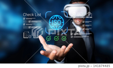 Businessman in Virtual Reality Glasses with ISO Certification Concept and Check List Graphics for Technology and Innovation in Modern Work Environment Gluon Businessman in Virtual Reality Glasses with ISO Certification Concept and Check List Graphics for Technology and Innovation in Modern Work Environment Gluon 141874485