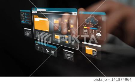 A close-up view of hands typing on a keyboard with floating digital file management windows, showcasing folder organization and cloud storage concepts for modern business environments. Sigmoid A close-up view of hands typing on a keyboard with floating digital file management windows, showcasing folder organization and cloud storage concepts for modern business environments. Sigmoid 141874964