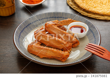 spicy Braised Duck Wings with Chili and Sichuan Pepper spicy Braised Duck Wings with Chili and Sichuan Pepper 141875081