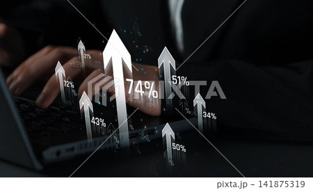 This image captures the essence of business growth, featuring hands on a laptop with rising graph arrows, symbolizing success, data analysis, and positive trends in finance. Sigmoid 141875319