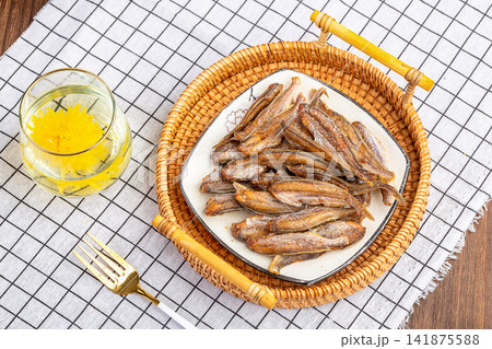 crispy Dried Fish Snack with Golden Fried Texture crispy Dried Fish Snack with Golden Fried Texture 141875588