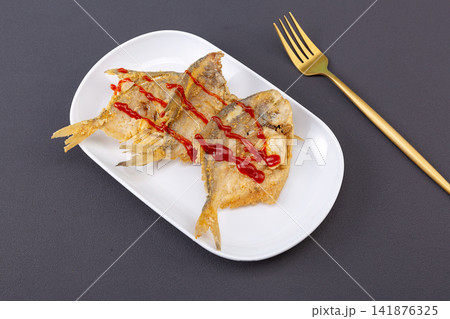 crispy Fried Small Fish Snack Golden Deep Fried Seafood crispy Fried Small Fish Snack Golden Deep Fried Seafood 141876325