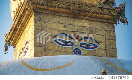 Wisdom eyes of Buddha on golden Swayambhunath stupa in Kathmandu Nepal with copy space Wisdom eyes of Buddha on golden Swayambhunath stupa in Kathmandu Nepal with copy space 141876766
