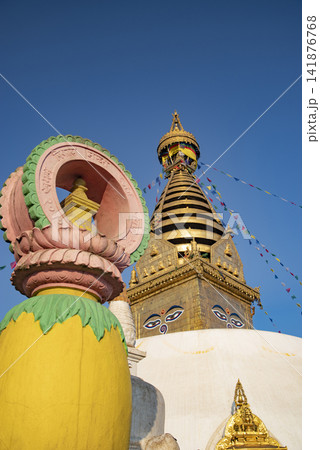 Golden Swayambhunath stupa with Dharmachakra symbol in Kathmandu Nepal with sky copy space Golden Swayambhunath stupa with Dharmachakra symbol in Kathmandu Nepal with sky copy space 141876768
