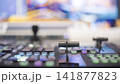 Professional broadcast switcher fader lever with colorful glowing buttons and copy space 141877823