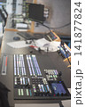 Professional television broadcast control room desk with video switcher and copy space 141877824