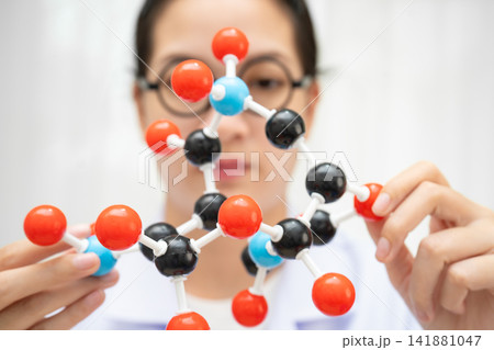 Molecules chemical on a periodic table background. Molecules chemical on a periodic table background. 141881047