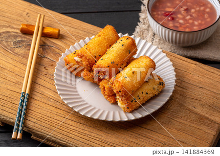 deep fried milk pudding rolls with crispy golden breadcrumbs deep fried milk pudding rolls with crispy golden breadcrumbs 141884369