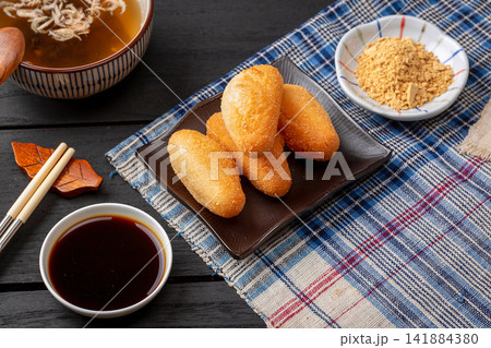 deep fried crispy sticky rice cake rolls with breadcrumbs coating deep fried crispy sticky rice cake rolls with breadcrumbs coating 141884380