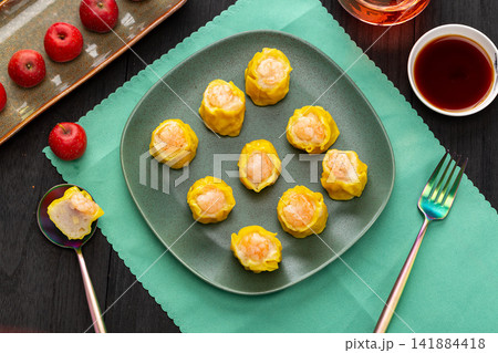 steamed open face shumai dumplings topped with succulent whole shrimp 141884418
