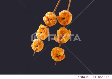 grilled Shrimp Skewers Seasoned with Barbecue Spices and Herbs 141884877