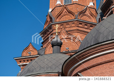 Majestic spires rise against the blue sky at Holy Assumption Cathedral in Tula Russia showcasing intricate architecture and rich history Majestic spires rise against the blue sky at Holy Assumption Cathedral in Tula Russia showcasing intricate architecture and rich history 141888321