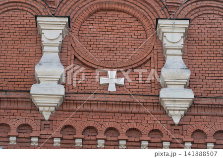 Intricate brickwork and decorative elements on the Holy Assumption Cathedral in Tula Russia showcasing architectural beauty Intricate brickwork and decorative elements on the Holy Assumption Cathedral in Tula Russia showcasing architectural beauty 141888507