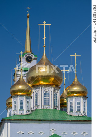Glistening domes of the Cathedral of the Assumption shining under the blue sky in Tula Russia 141888863