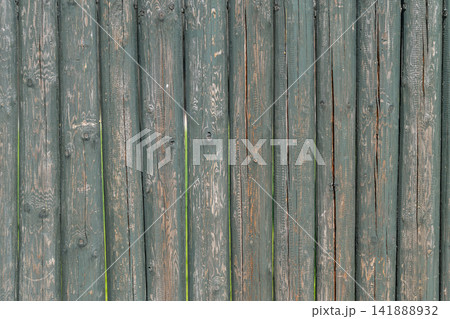 Rustic wooden fence stands tall in a serene garden bathed in soft morning light and echoing the charm of countryside living Rustic wooden fence stands tall in a serene garden bathed in soft morning light and echoing the charm of countryside living 141888932