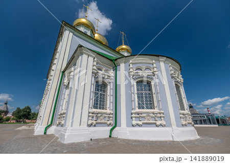 Stunning view of Cathedral of the Assumption in Tula Russia highlighting its golden domes against a brilliant blue sky Stunning view of Cathedral of the Assumption in Tula Russia highlighting its golden domes against a brilliant blue sky 141889019