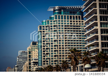 Modern hotel skyline and Mediterranean coastline seen from the Charles Clore promenade in Tel Aviv Modern hotel skyline and Mediterranean coastline seen from the Charles Clore promenade in Tel Aviv 141889334