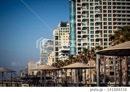 Modern hotel skyline and Mediterranean coastline seen from the Charles Clore promenade in Tel Aviv Modern hotel skyline and Mediterranean coastline seen from the Charles Clore promenade in Tel Aviv 141889338