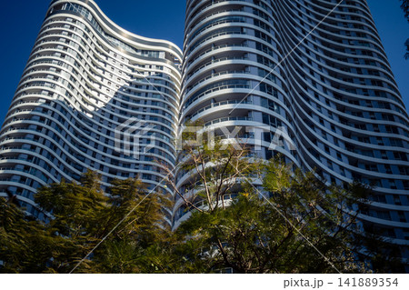 Modern urban skyline featuring a dense cluster of high-rise corporate architecture in Tel Aviv 141889354
