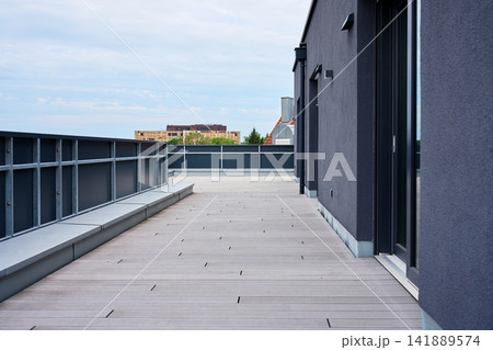 Empty apartment terrace with wooden decking Empty apartment terrace with wooden decking 141889574