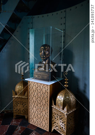 Bronze bust of Augustin Fresnel in glass case on carved pedestal with decorative lanterns Bronze bust of Augustin Fresnel in glass case on carved pedestal with decorative lanterns 141893737