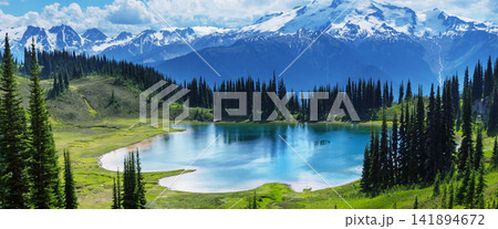 Alpine Lake and Snow-Capped Mountains Panorama Alpine Lake and Snow-Capped Mountains Panorama 141894672