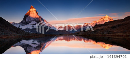 Matterhorn Mountain Sunrise Reflection in Alpine Lake Matterhorn Mountain Sunrise Reflection in Alpine Lake 141894791