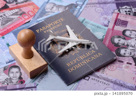 Dominican republic passport or id document with tickets for flight, travel, border crossing Dominican republic passport or id document with tickets for flight, travel, border crossing 141895070