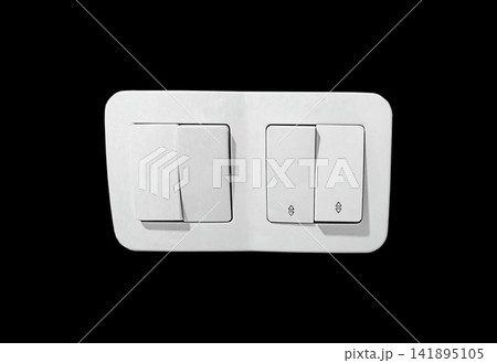 White wall light switches and roller shutter controls isolated on black background. Electrical devices for home lighting, wiring, renovation, electrician work, repair and modern interior installation. White wall light switches and roller shutter controls isolated on black background. Electrical devices for home lighting, wiring, renovation, electrician work, repair and modern interior installation. 141895105