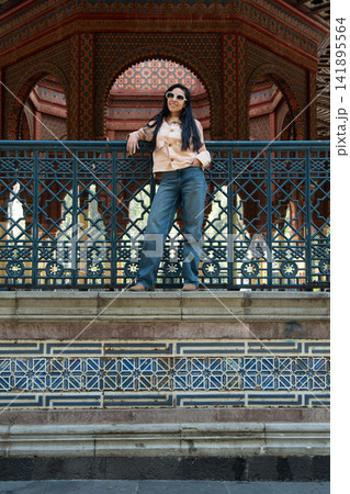 Woman posing at kiosco morisco in mexico city Woman posing at kiosco morisco in mexico city 141895564