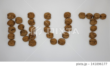 Walnuts arranged in the word "NUT" Walnuts arranged in the word "NUT" 141896177