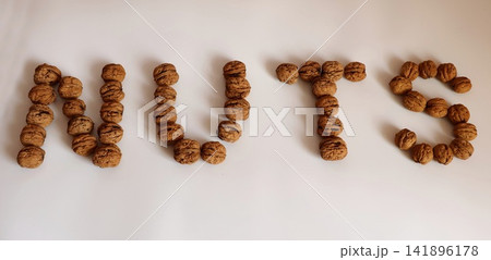 Walnuts arranged in the word "NUTS" Walnuts arranged in the word "NUTS" 141896178