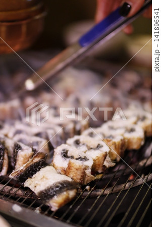 Grilled Fish Skewers on Charcoal Grill 141896541