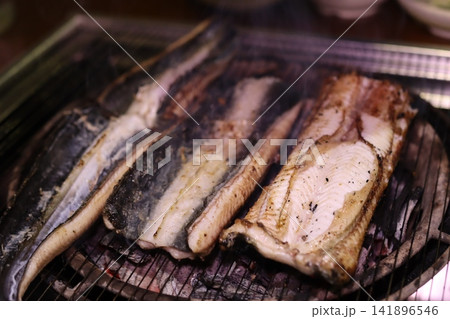 Grilled Fish on Charcoal Grill 141896546