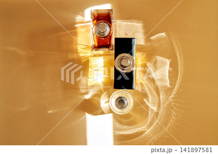 Functional mood fragrance bottles catching golden light Functional mood fragrance bottles catching golden light 141897581