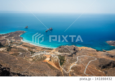Xerokambos, Crete, aerial coastline with turquoise sea and rocky landscape 141898432