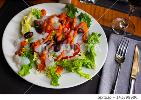 Traditional catalan salad Xatonada with crumbled cod Traditional catalan salad Xatonada with crumbled cod 141898980